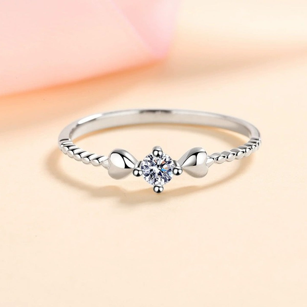 Floral Moissanite Ring in Rhodium-Plated S925 Sterling Silver studio product angle showing the ring setting, stone detail, and band design