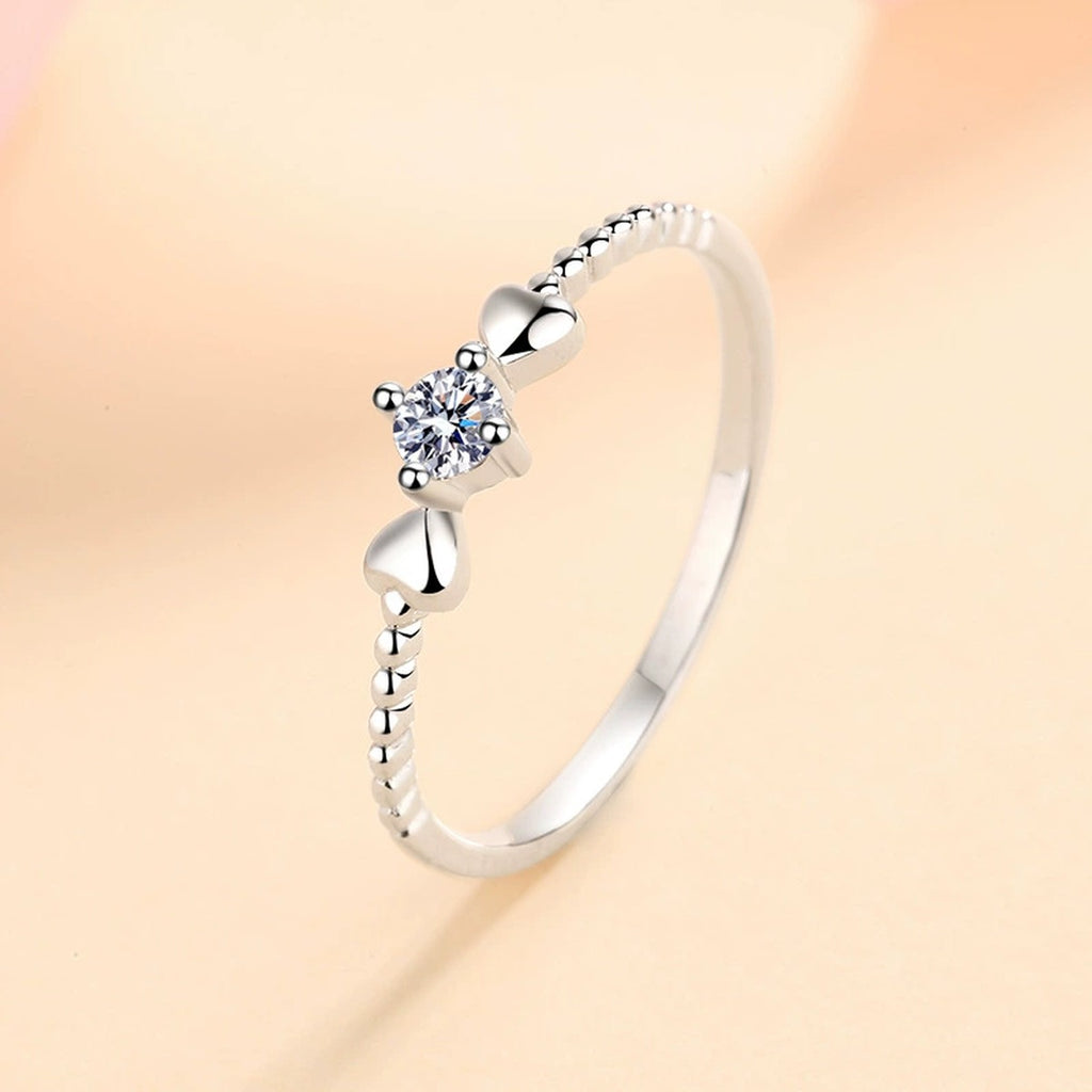 Floral Moissanite Ring in Rhodium-Plated S925 Sterling Silver studio product angle showing the ring setting, stone detail, and band design