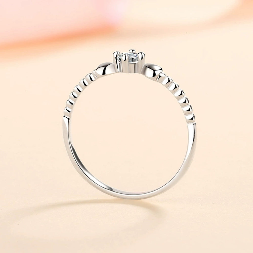 Floral Moissanite Ring in Rhodium-Plated S925 Sterling Silver studio product angle showing the ring setting, stone detail, and band design