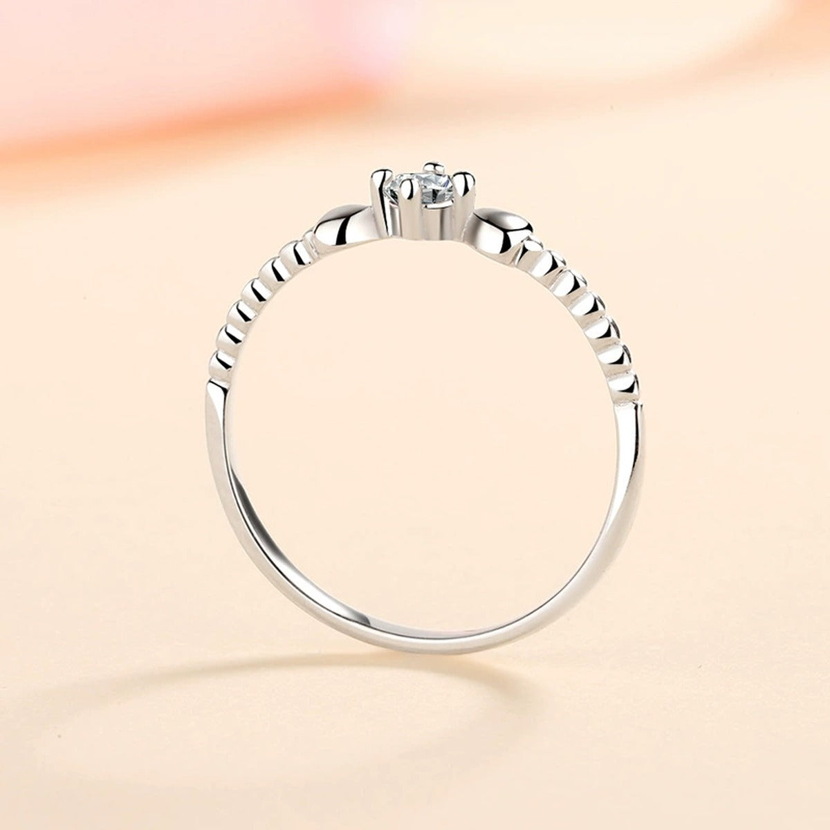 Floral Moissanite Ring in Rhodium-Plated S925 Sterling Silver studio product angle showing the ring setting, stone detail, and band design