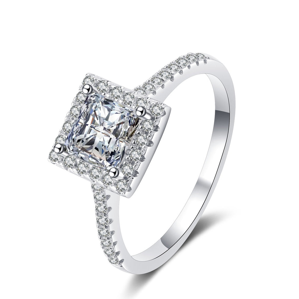 Princess Cut Moissanite Halo Engagement Ring with CZ in rhodium-plated S925 sterling silver on clean white background