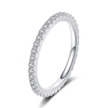 Moissanite Eternity Band Ring in Rhodium-Plated S925 Sterling Silver clean white background product photo showing the ring silhouette and moissanite setting