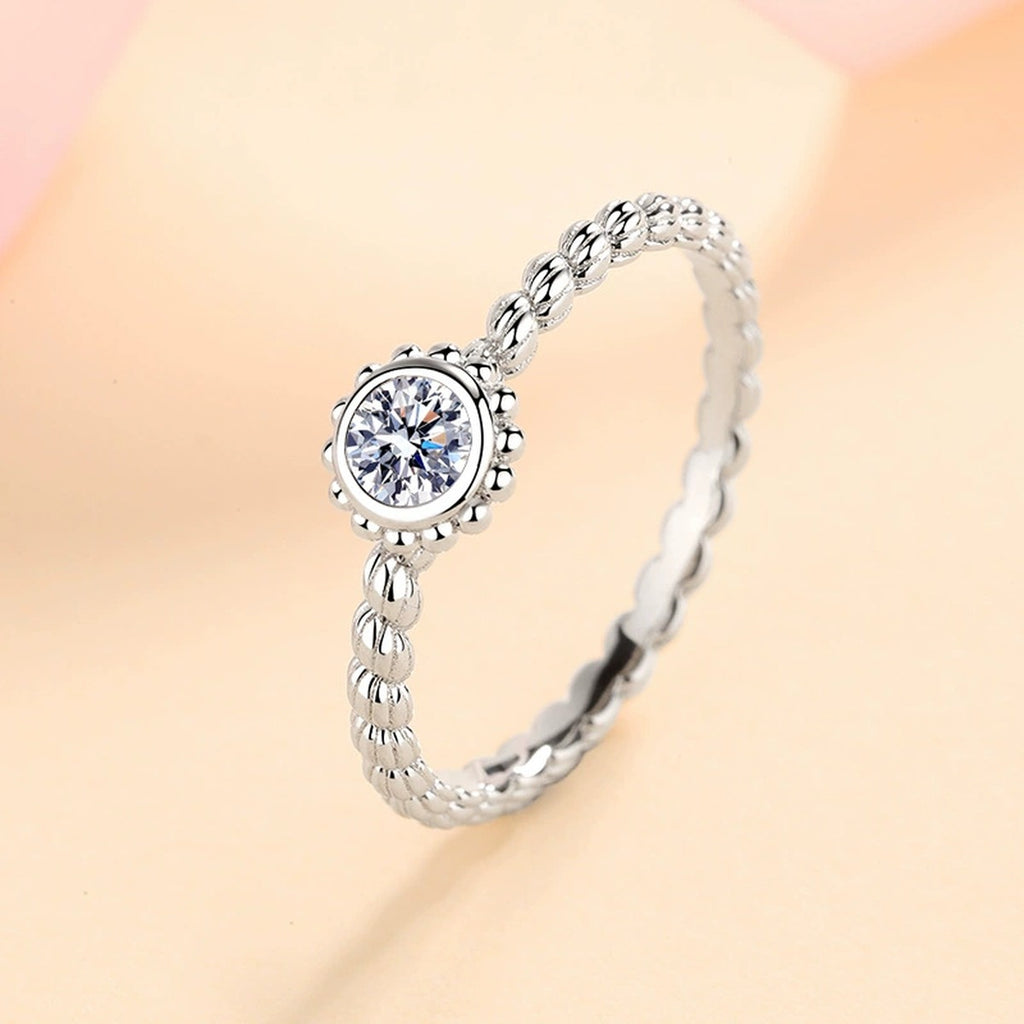 Bezel Moissanite Band Ring in Rhodium-Plated S925 Sterling Silver studio product angle showing the ring setting, stone detail, and band design