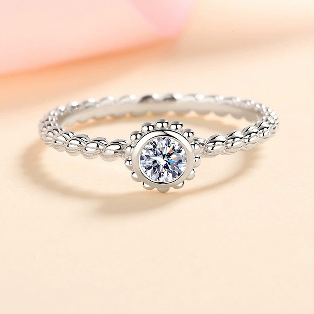 Bezel Moissanite Band Ring in Rhodium-Plated S925 Sterling Silver studio product angle showing the ring setting, stone detail, and band design