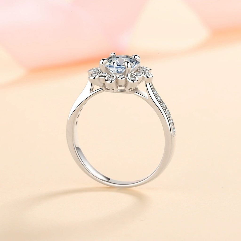 Round Floral Halo Moissanite Ring with CZ product view showing moissanite setting and metal finish