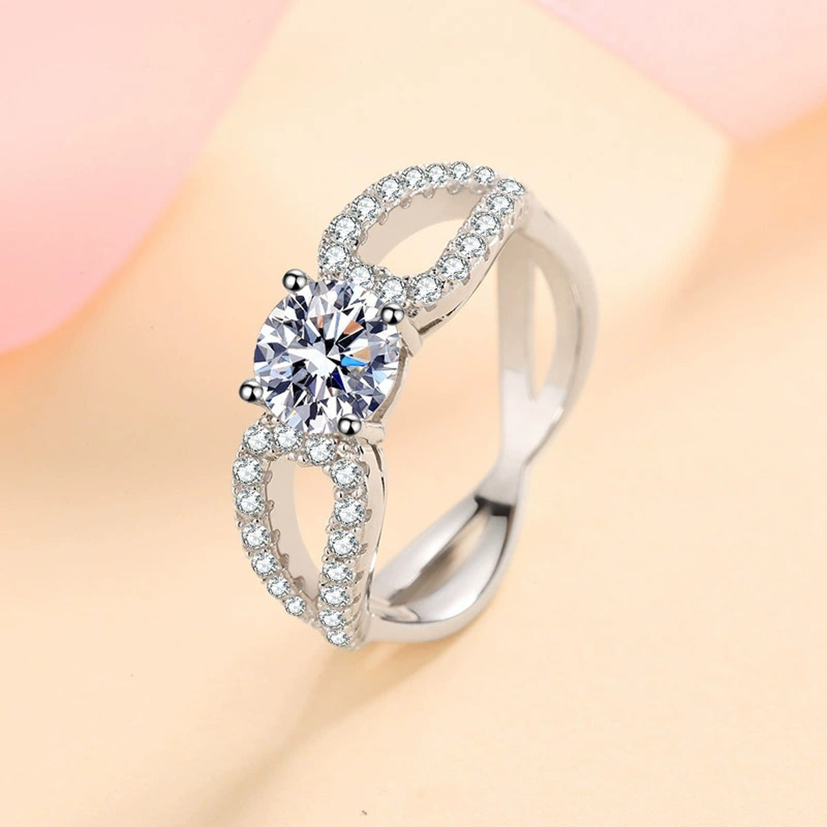Round Moissanite Side Stone Engagement Ring with CZ worn on hand to show scale, band width, and ring profile