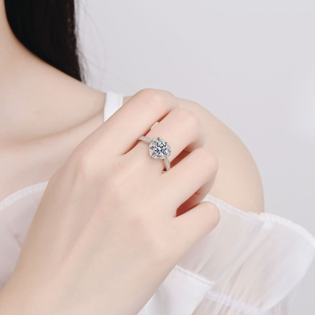 Round Heart Halo Moissanite Ring with CZ worn on hand to show scale, band width, and ring profile