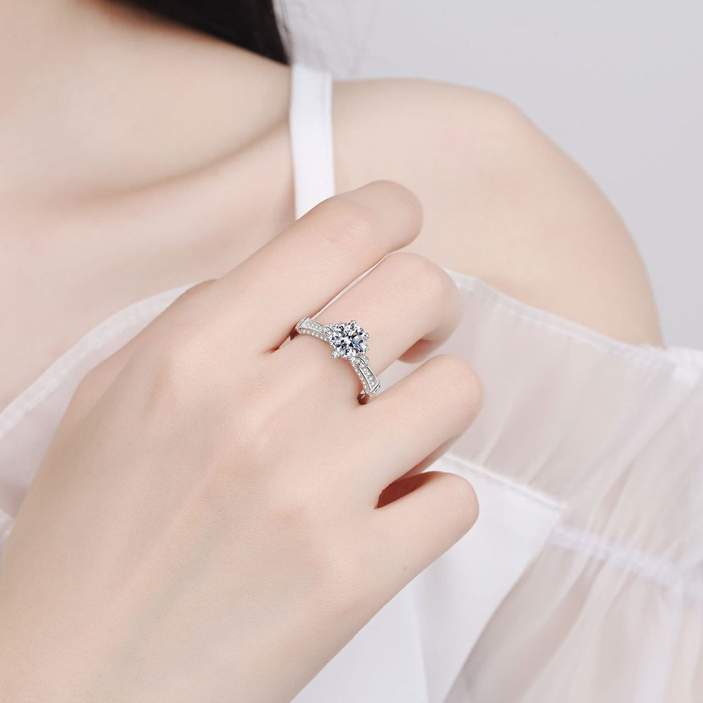 Round Moissanite Side Stone Ring with CZ worn on hand to show scale, band width, and ring profile