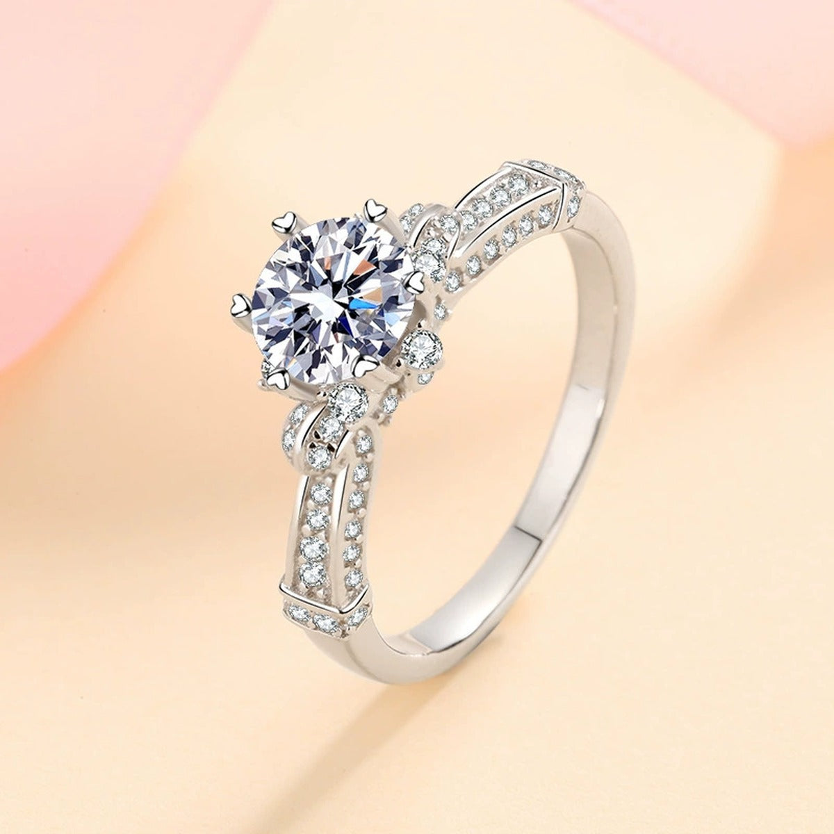 Round Moissanite Side Stone Ring with CZ product view showing moissanite setting and metal finish