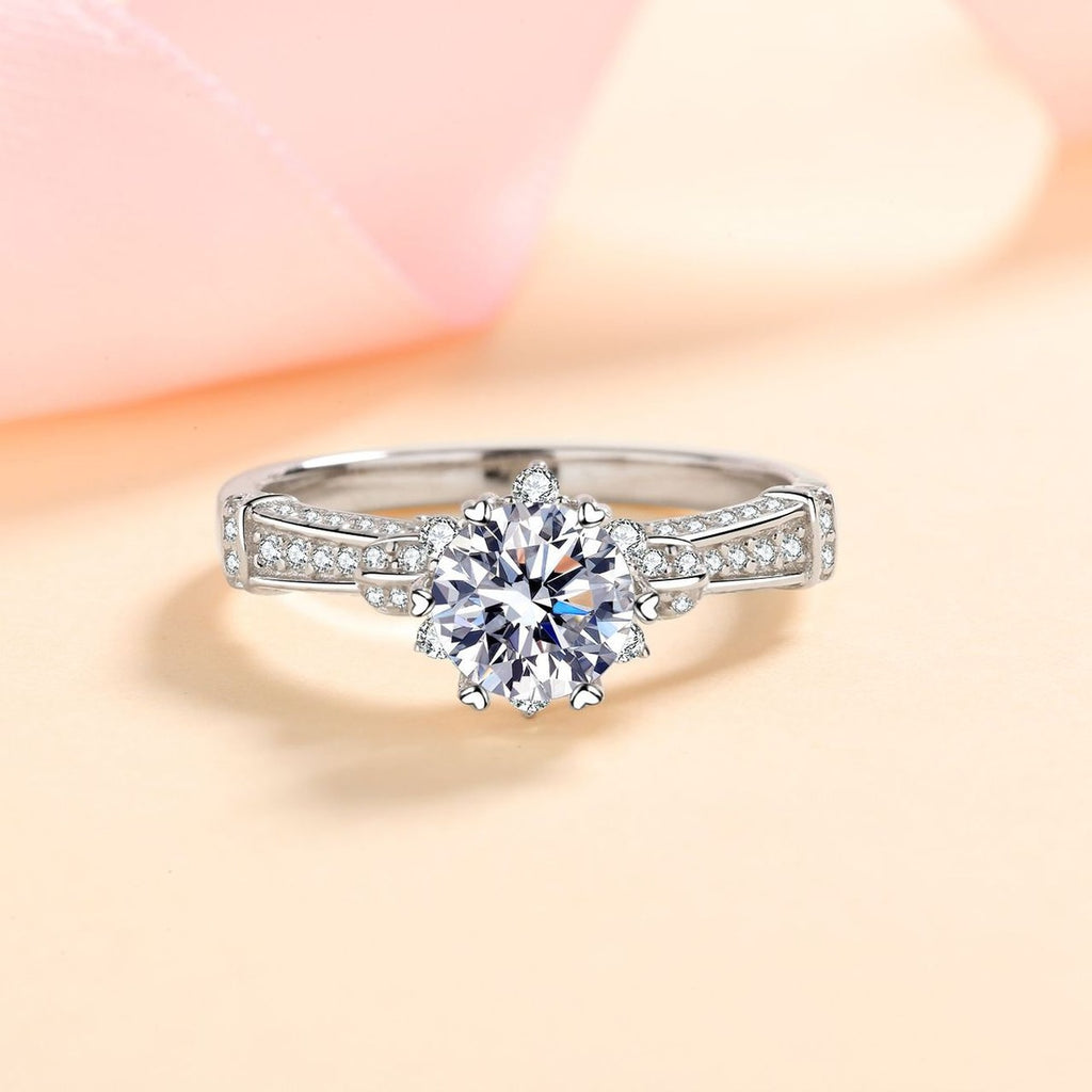 Round Moissanite Side Stone Ring with CZ product view showing moissanite setting and metal finish
