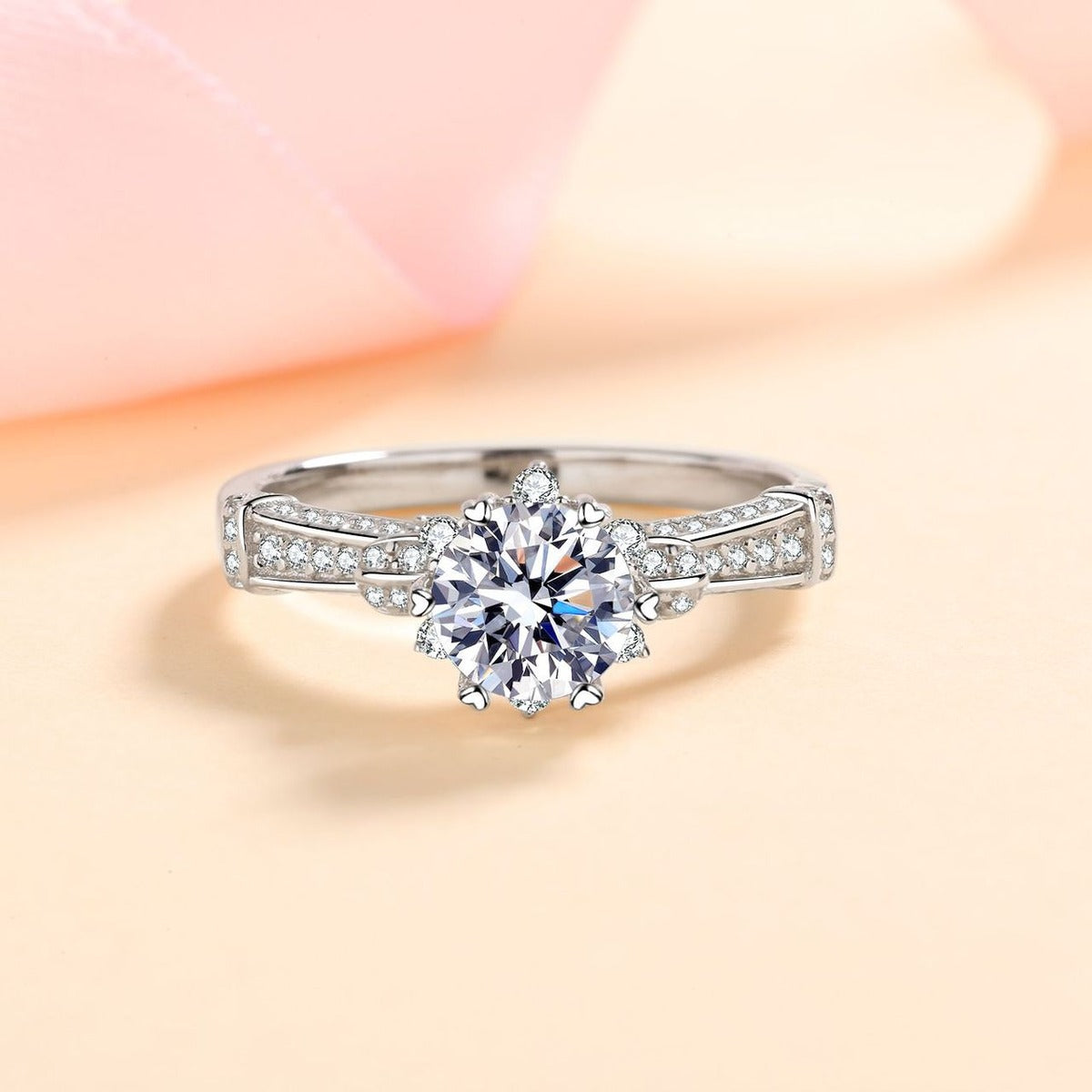Round Moissanite Side Stone Ring with CZ product view showing moissanite setting and metal finish