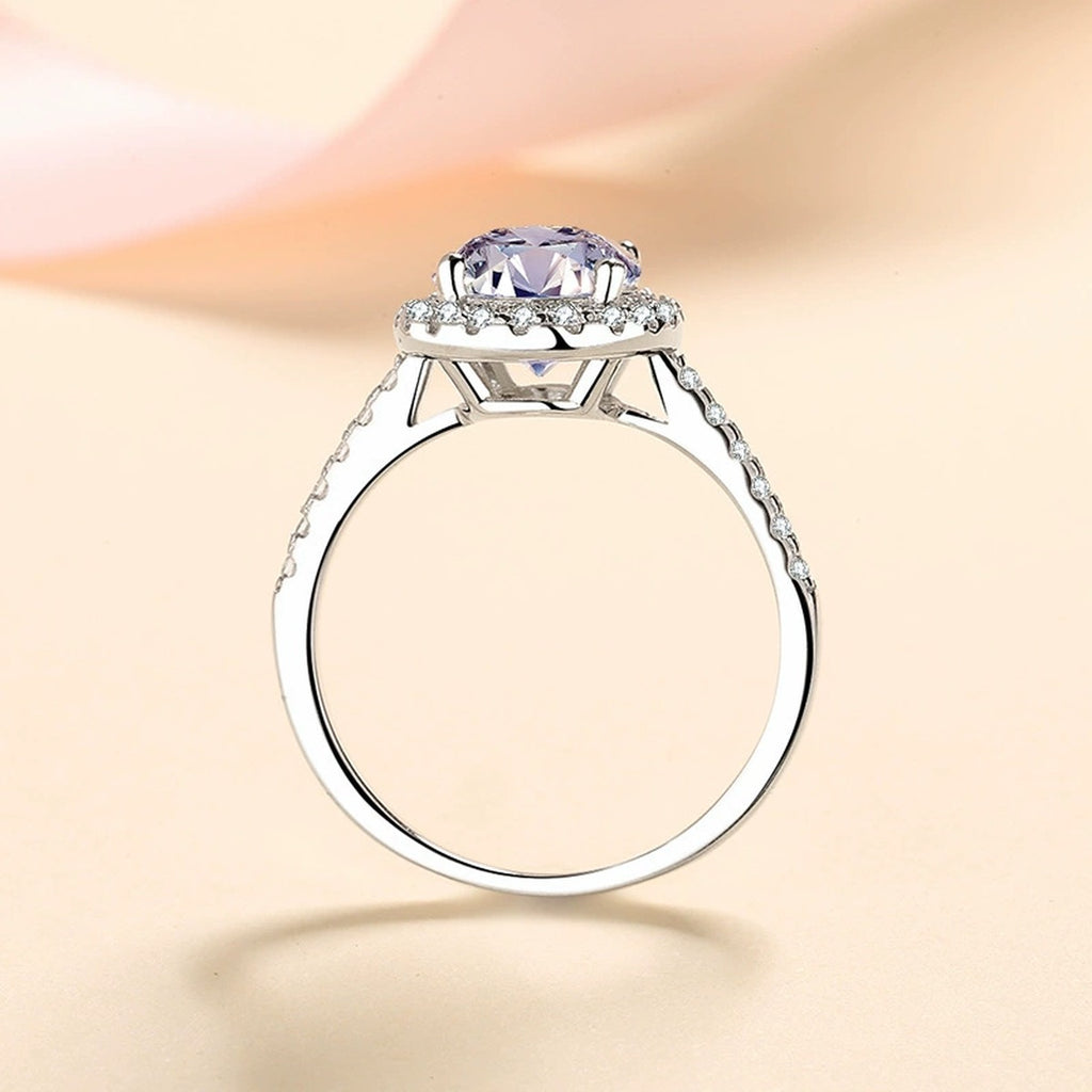 Oval Moissanite Ring with CZ in Rhodium-Plated S925 Sterling Silver studio product angle showing the ring setting, stone detail, and band design