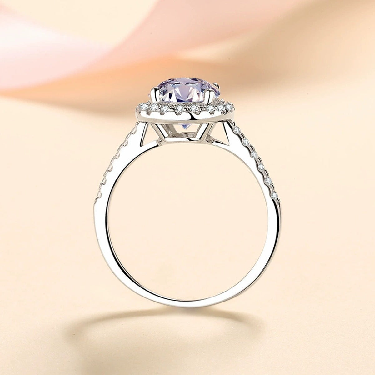 Oval Moissanite Ring with CZ in Rhodium-Plated S925 Sterling Silver studio product angle showing the ring setting, stone detail, and band design