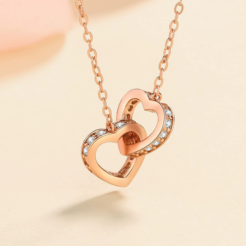 Linked Heart Moissanite Pendant Necklace in Rhodium and Rose Gold-Plated S925 sterling silver product scene view showing close-up styling
