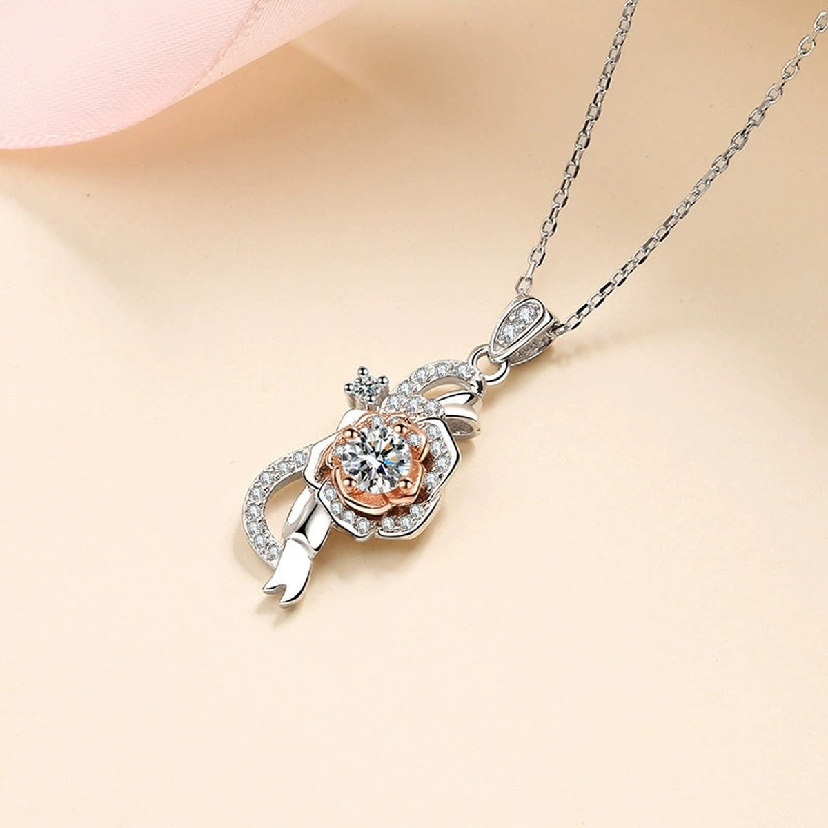 Bow Rose Moissanite Pendant Necklace with CZ in Rhodium and Rose Gold-Plated S925 sterling silver product scene view showing pendant detail