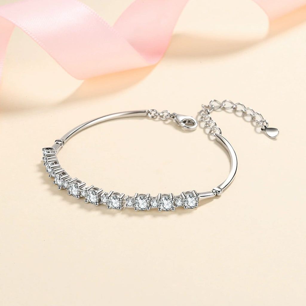 Graduated Tennis Moissanite Adjustable Bracelet in Rhodium-Plated S925 sterling silver styled product scene showing stone sparkle and chain detail