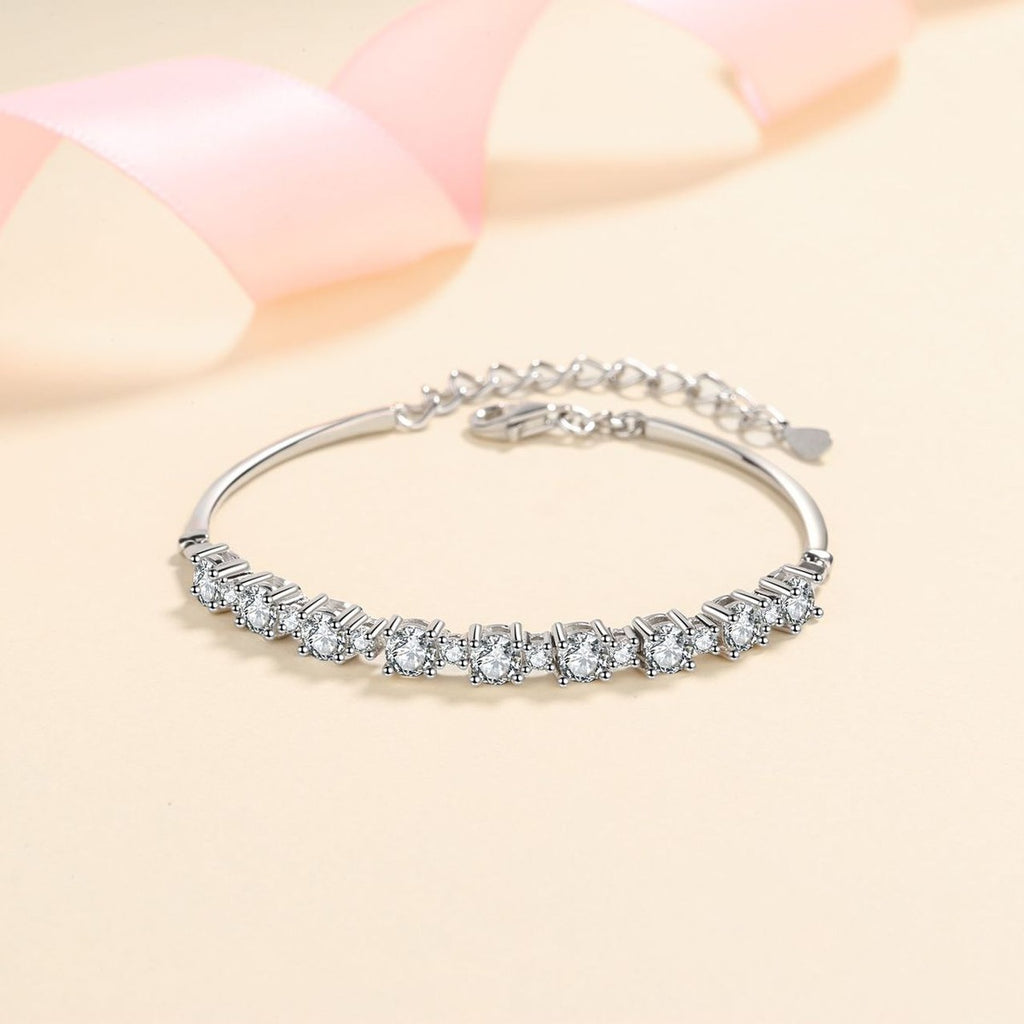 Graduated Tennis Moissanite Adjustable Bracelet in Rhodium-Plated S925 sterling silver angled product display showing bracelet silhouette