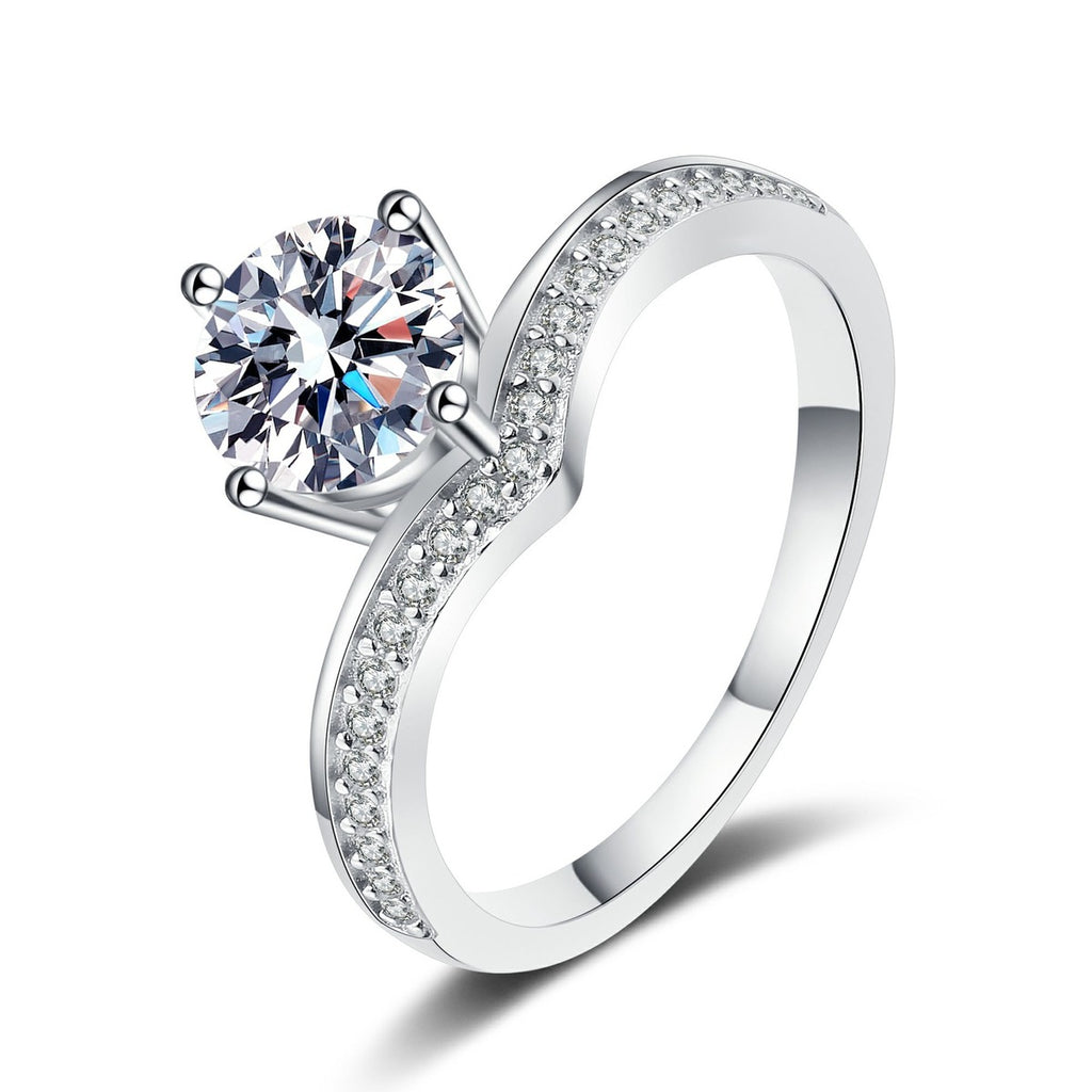 Round Moissanite Side Stone Engagement Ring with CZ in rhodium-plated S925 sterling silver on clean white background