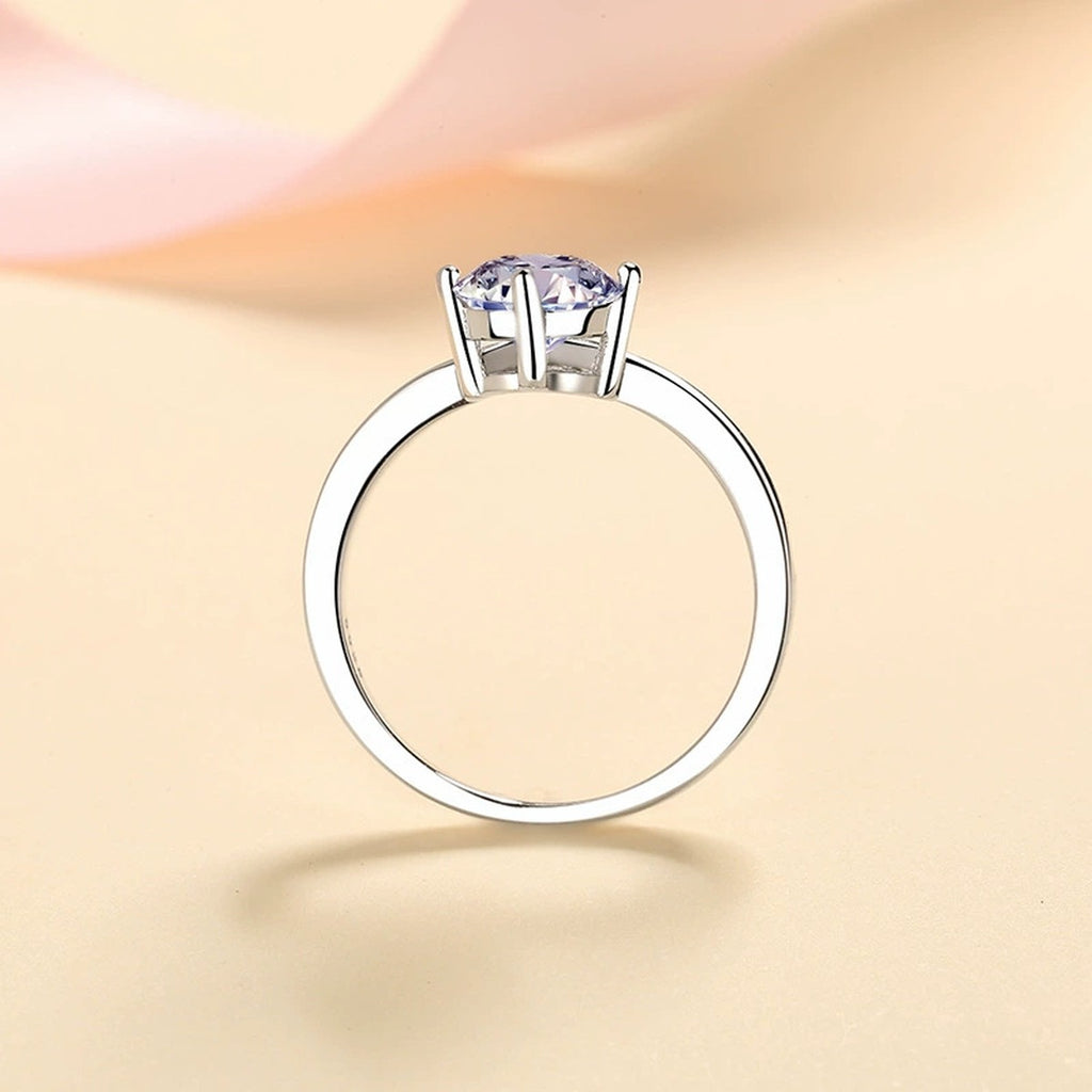 Round Moissanite Side Stone Engagement Ring with CZ product view showing moissanite setting and metal finish