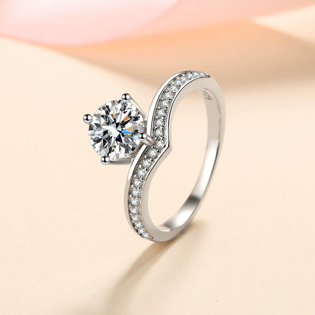 Round Moissanite Side Stone Engagement Ring with CZ product view showing moissanite setting and metal finish