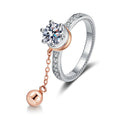 Round Moissanite Side Stone Engagement Ring with CZ in champagne gold-plated S925 sterling silver on clean white background