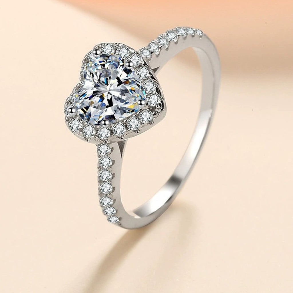 Heart Moissanite Ring with CZ in Rhodium-Plated S925 Sterling Silver studio product angle showing the ring setting, stone detail, and band design