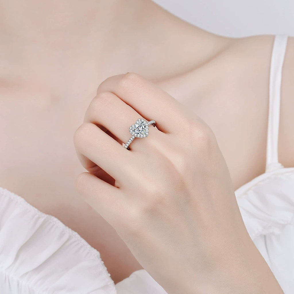 Heart Moissanite Ring with CZ in Rhodium-Plated S925 Sterling Silver worn on hand, showing scale, finger coverage, and rhodium-plated finish