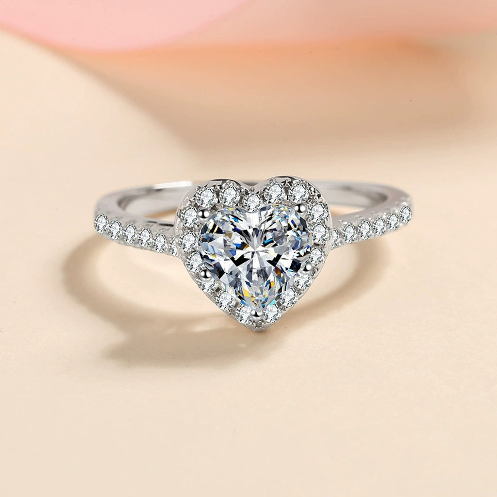 Heart Moissanite Ring with CZ in Rhodium-Plated S925 Sterling Silver studio product angle showing the ring setting, stone detail, and band design