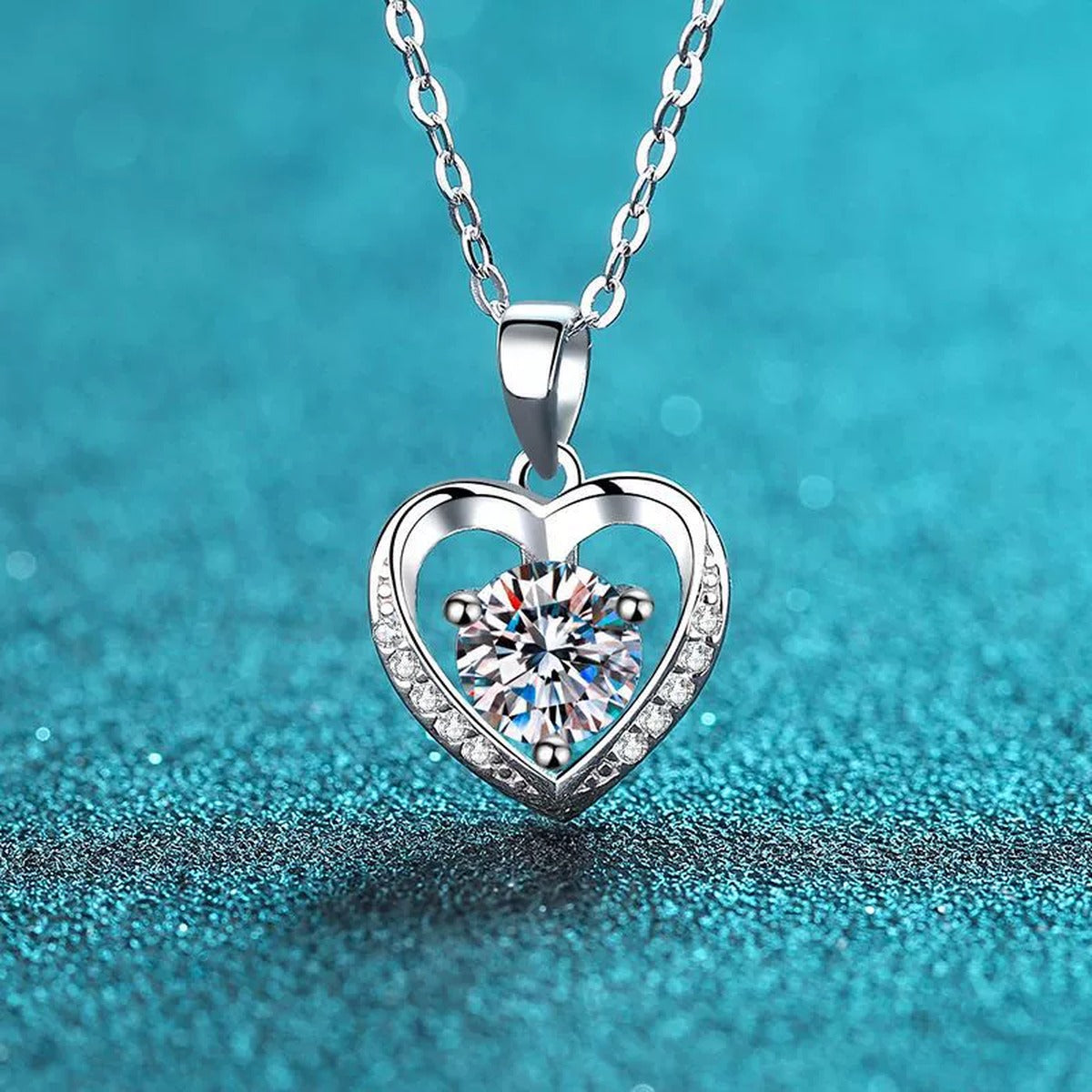 Heart Halo Round Moissanite Necklace with CZ in Rhodium-Plated S925 sterling silver close-up product scene showing pendant setting