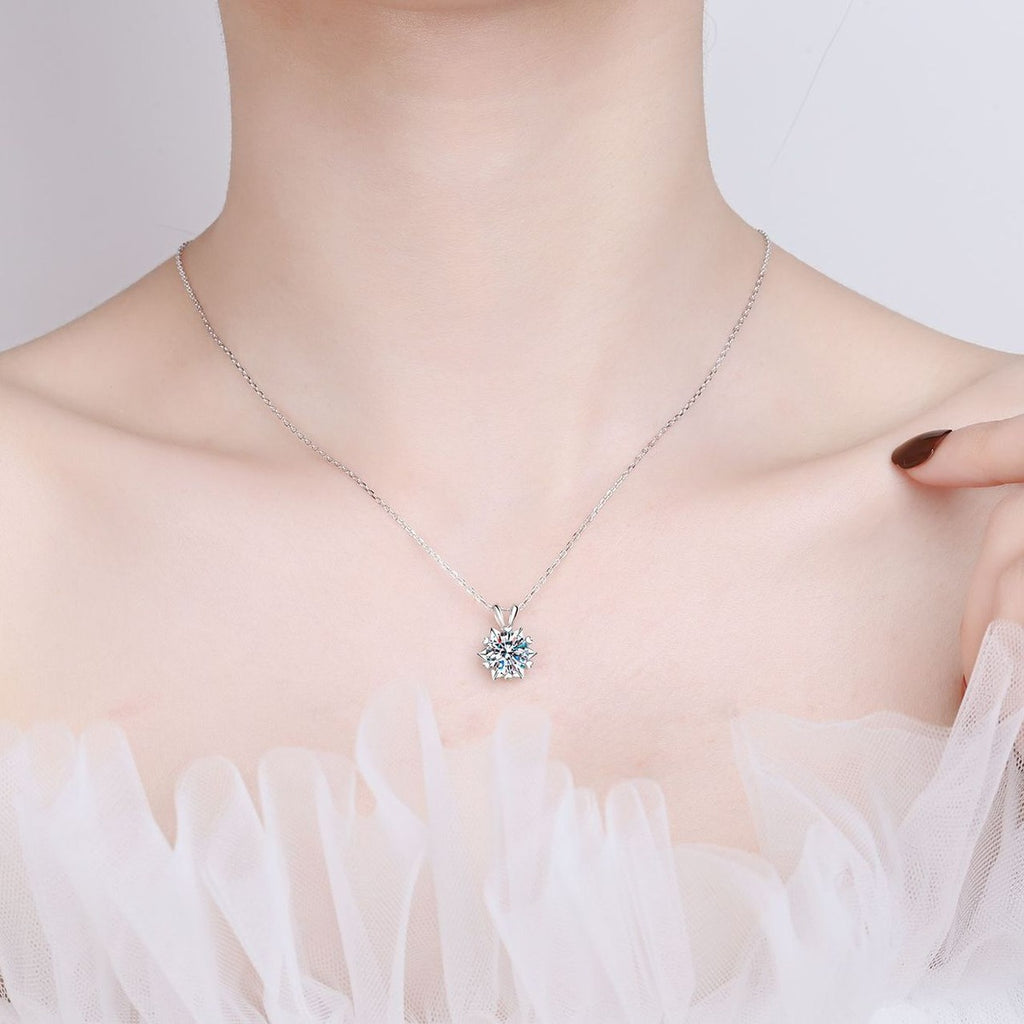 Six-Point Star Moissanite Pendant Necklace in Rhodium-Plated S925 sterling silver worn on neckline by model showing scale and adjustable chain styling