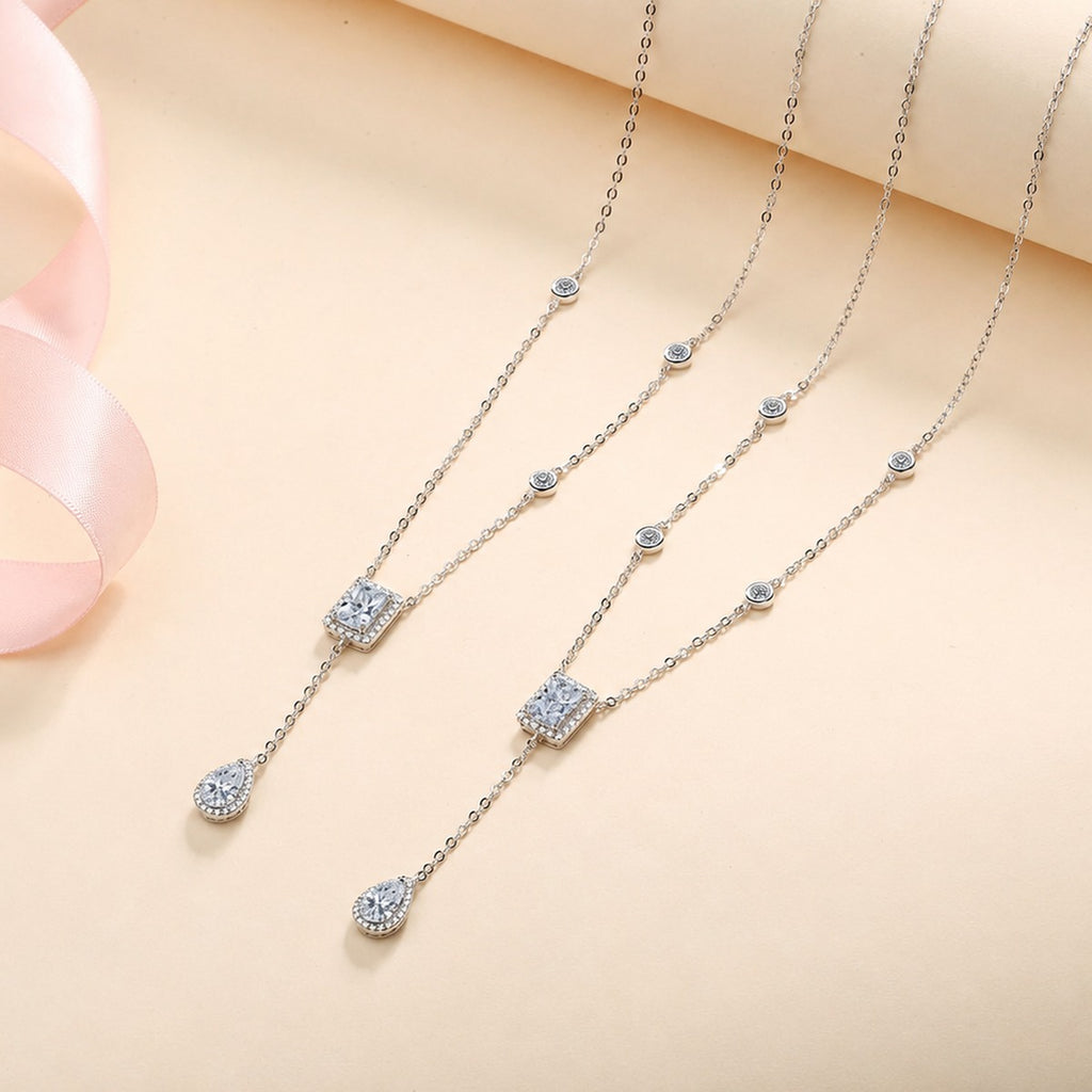 Radiant and Pear Moissanite Charm Necklace with CZ in Rhodium-Plated S925 sterling silver product scene view showing pendant detail