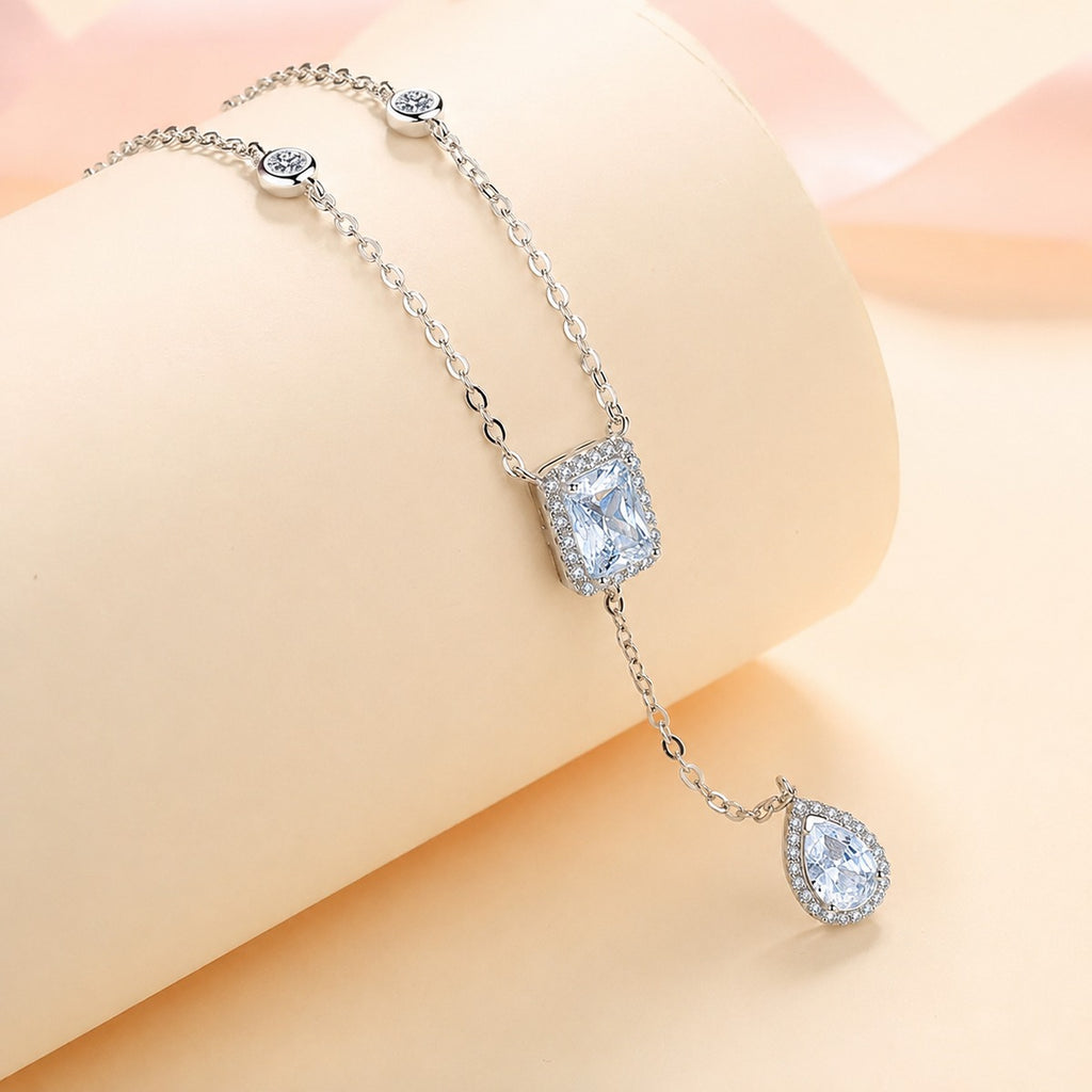 Radiant and Pear Moissanite Charm Necklace with CZ in Rhodium-Plated S925 sterling silver product scene view showing chain and setting detail