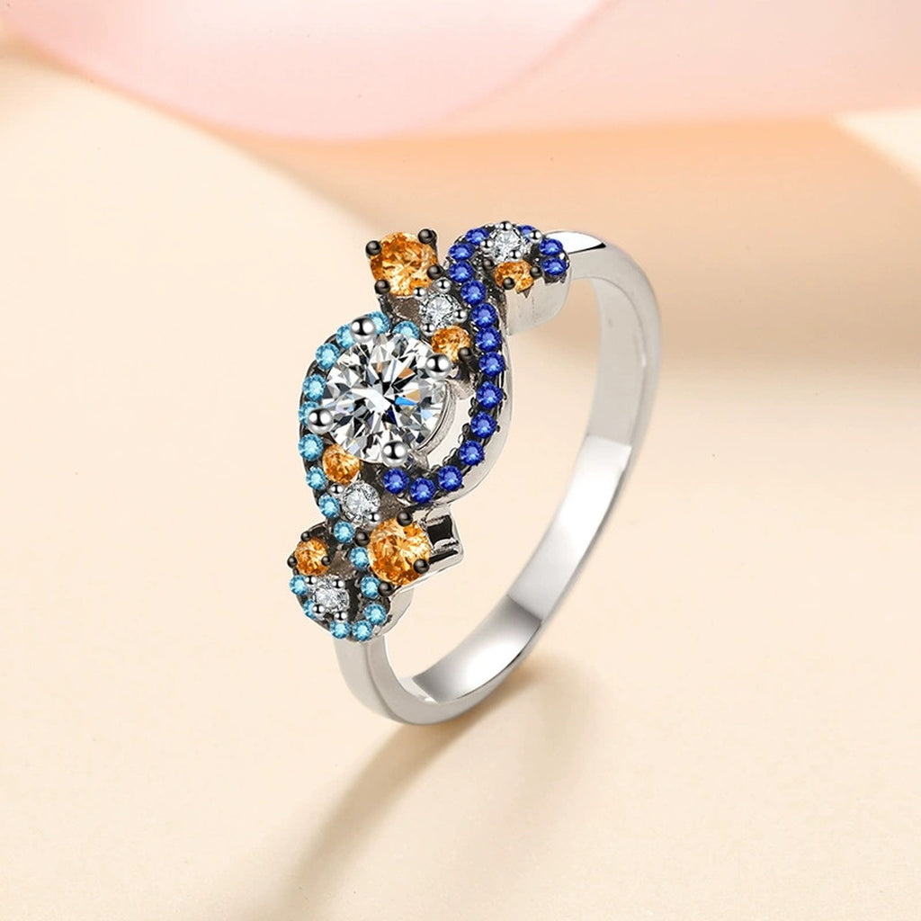Round Moissanite Statement Ring with Blue and Orange CZ product view showing moissanite setting and metal finish
