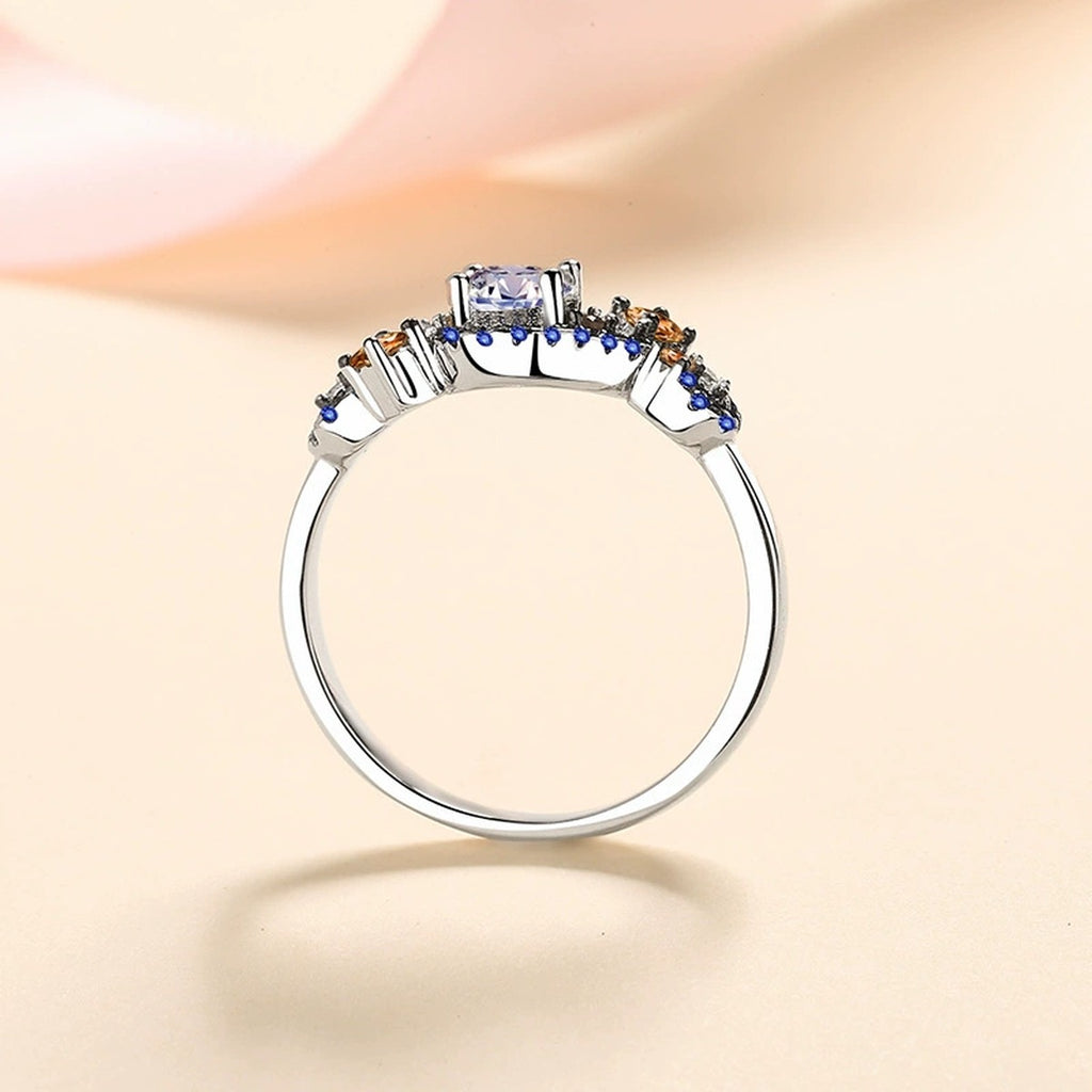 Round Moissanite Statement Ring with Blue and Orange CZ product view showing moissanite setting and metal finish