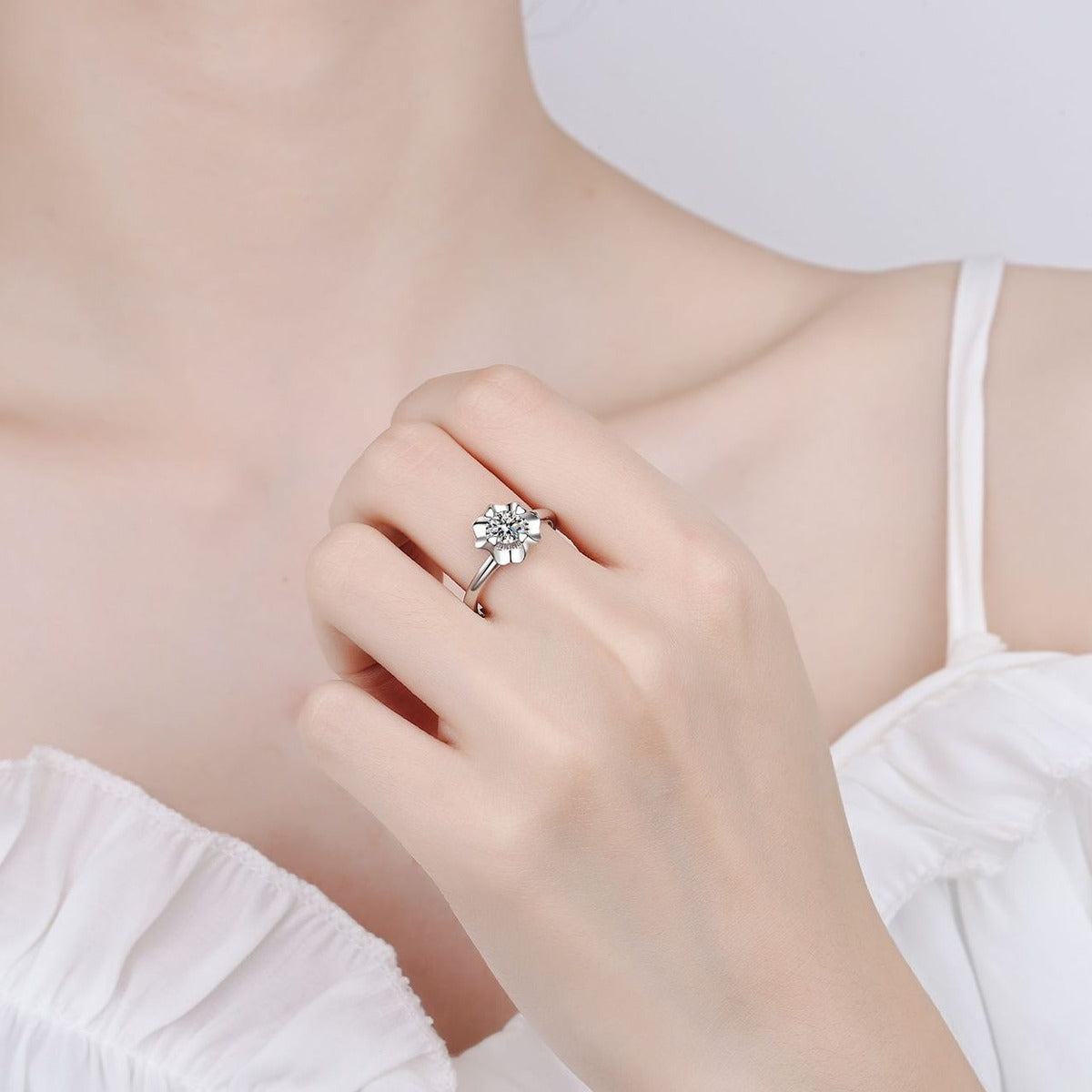 Round Floral Moissanite Ring worn on hand to show scale, band width, and ring profile