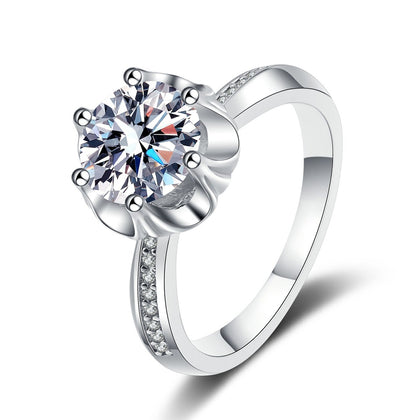 Round Moissanite Halo Engagement Ring with CZ in rhodium-plated S925 sterling silver on clean white background
