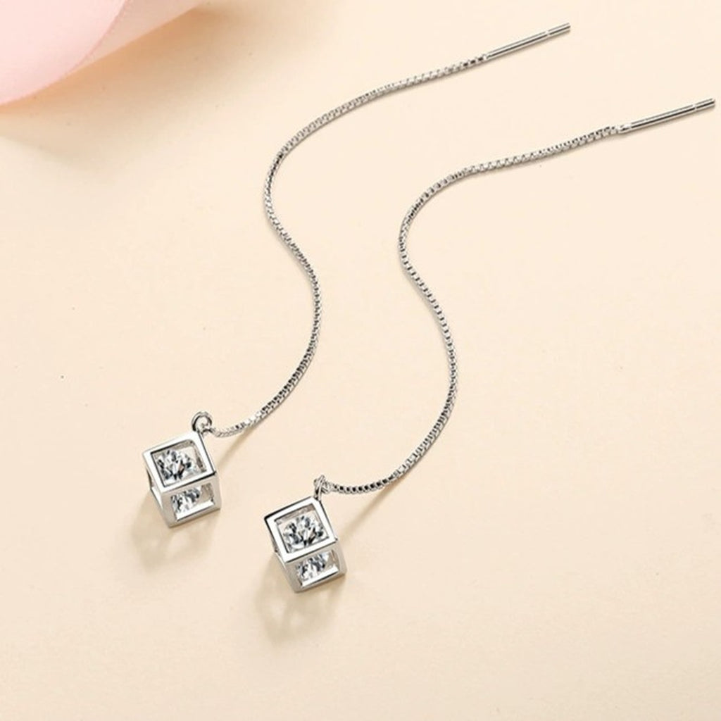 Round Moissanite Threader Drop Earrings in Rhodium-Plated S925 sterling silver product scene view showing angled setting detail