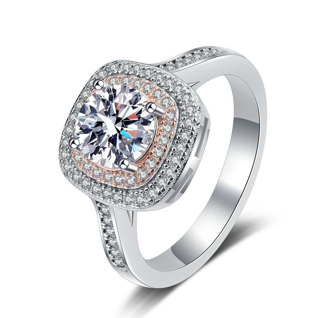 Pink Halo Moissanite Ring with CZ in Rhodium-Plated S925 Sterling Silver clean white background product photo showing the ring silhouette and moissanite setting