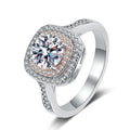 Pink Halo Moissanite Ring with CZ in Rhodium-Plated S925 Sterling Silver clean white background product photo showing the ring silhouette and moissanite setting