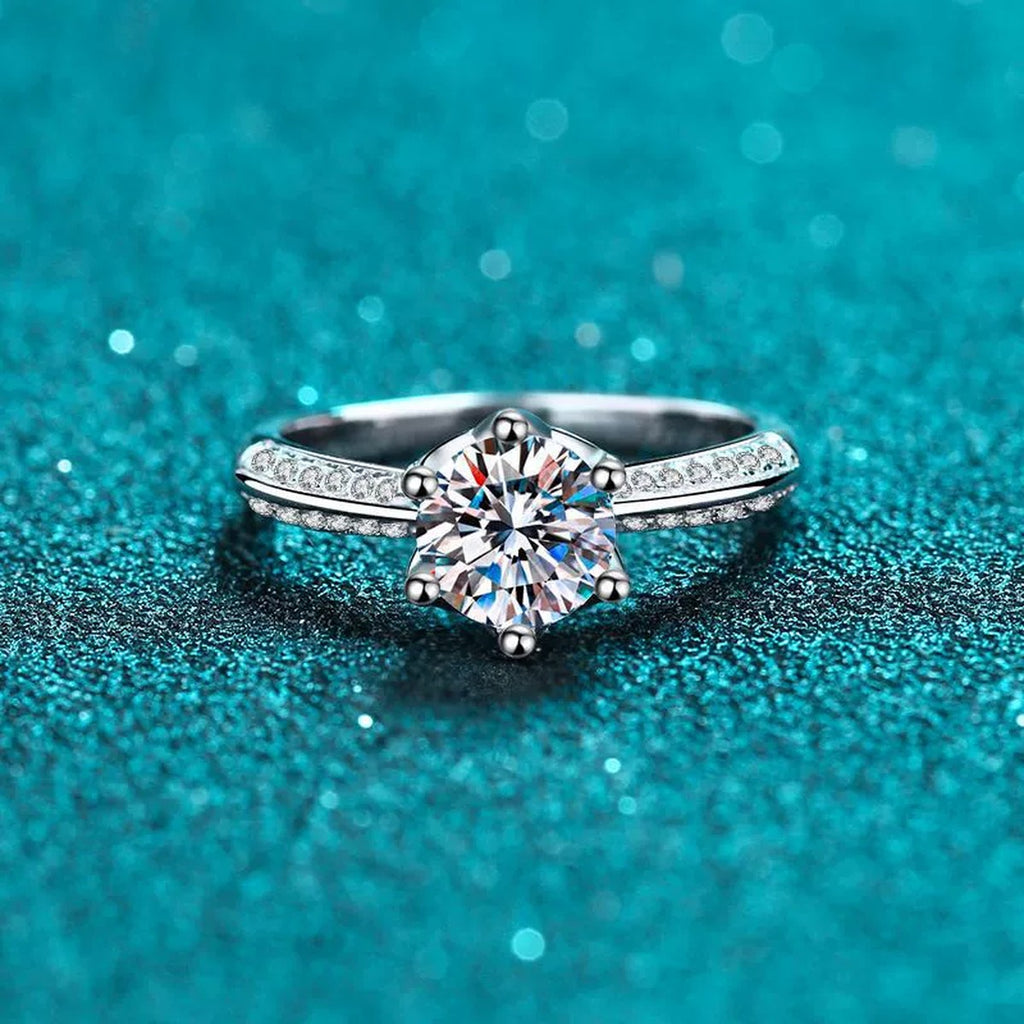Round Moissanite Adjustable Side Stone Ring with CZ product view showing moissanite setting and metal finish