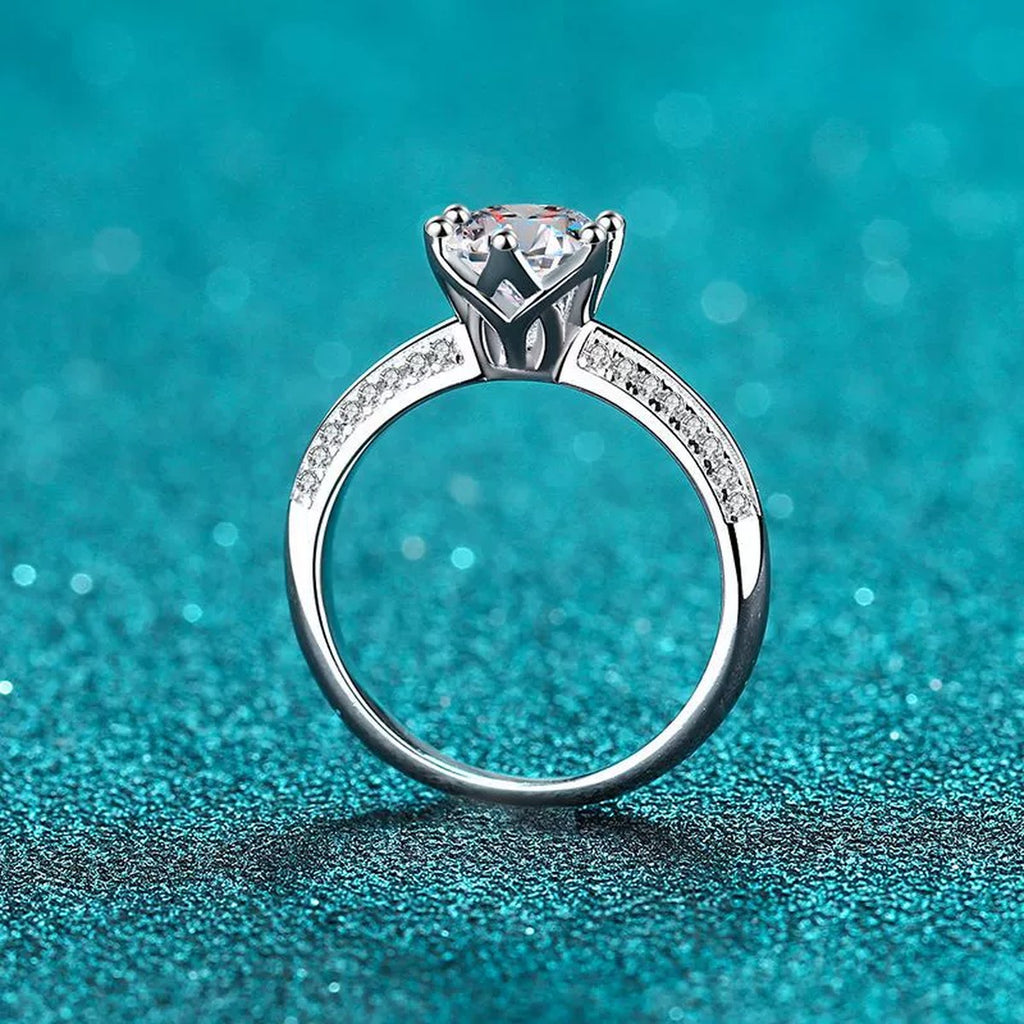 Round Moissanite Adjustable Side Stone Ring with CZ product view showing moissanite setting and metal finish