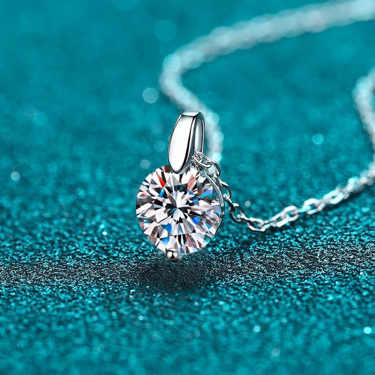Solitaire Moissanite Pendant Necklace in Rhodium-Plated S925 sterling silver product scene view showing angled sparkle