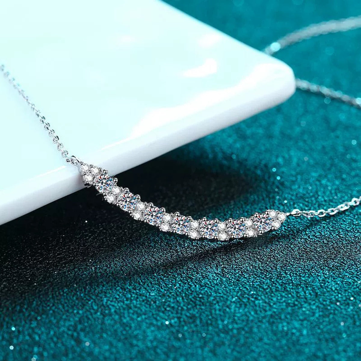 Smile Curve Moissanite Pendant Necklace with CZ in Rhodium-Plated S925 sterling silver product scene view showing chain and setting detail