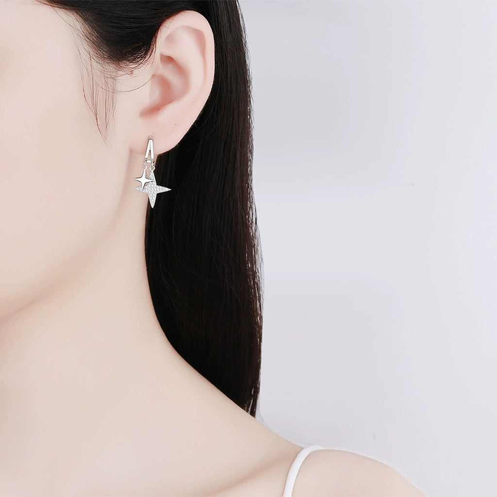 Star Moissanite Stud Dangle Earrings in Rhodium-Plated S925 sterling silver worn on ear by model showing scale, placement, and stud dangle earrings styling