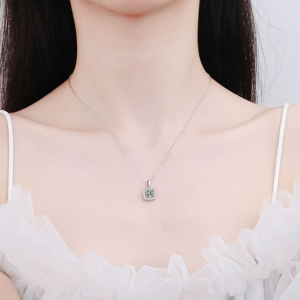 Sugar Cube Moissanite Pendant Necklace with CZ in Rhodium-Plated S925 sterling silver worn on neckline by model showing scale and adjustable chain styling