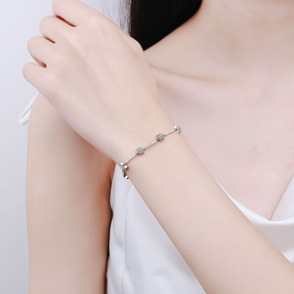 Star Moissanite Adjustable Bracelet with CZ in Rhodium-Plated S925 sterling silver worn on wrist model view showing scale and adjustable fit