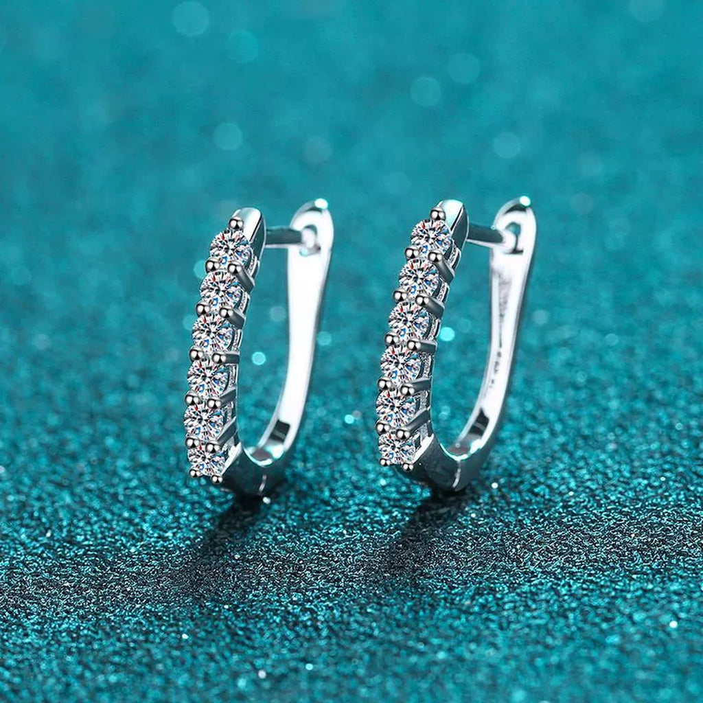 Pave Moissanite Huggie Hoop Earrings in Rhodium-Plated S925 sterling silver product scene view showing front sparkle