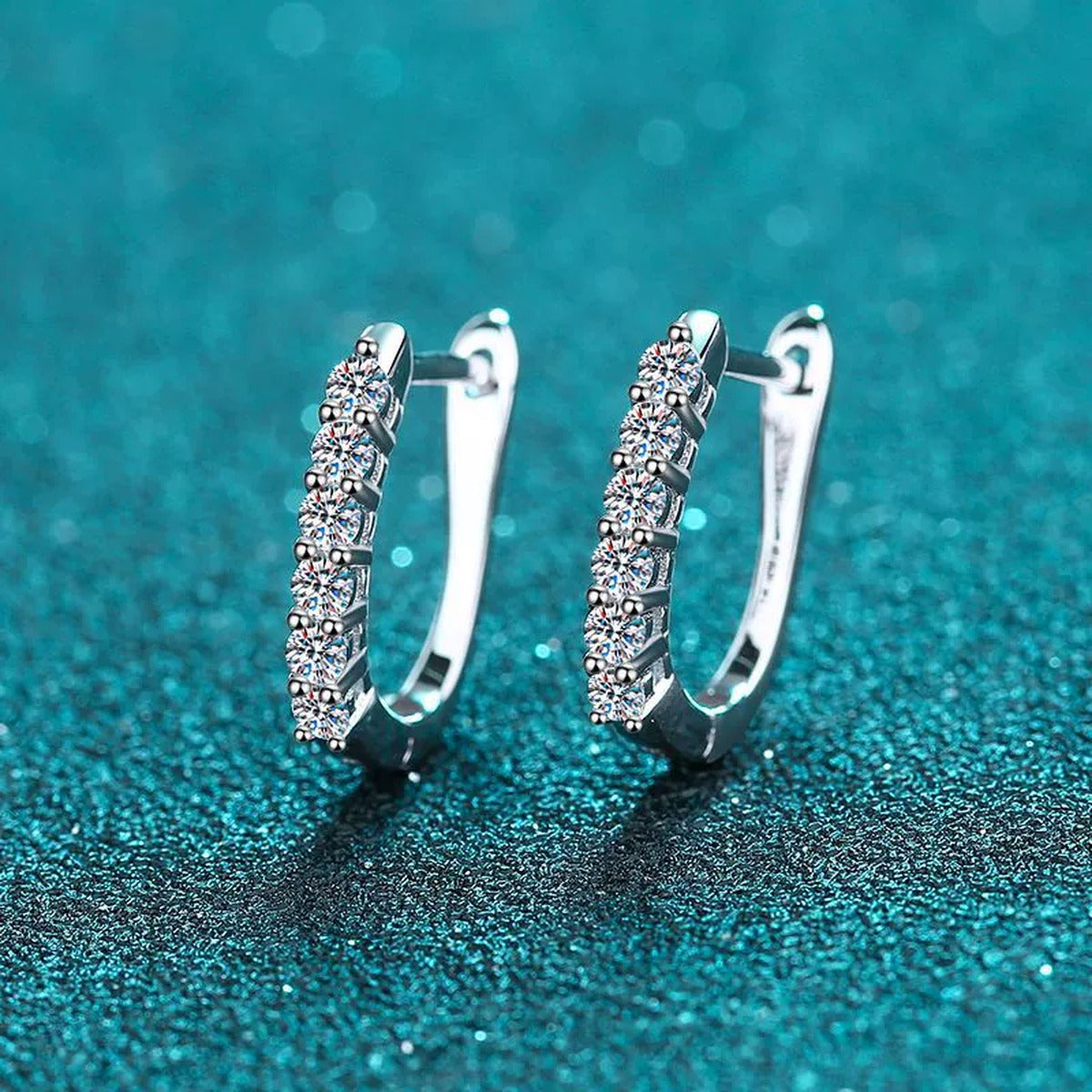 Pave Moissanite Huggie Hoop Earrings in Rhodium-Plated S925 sterling silver product scene view showing front sparkle