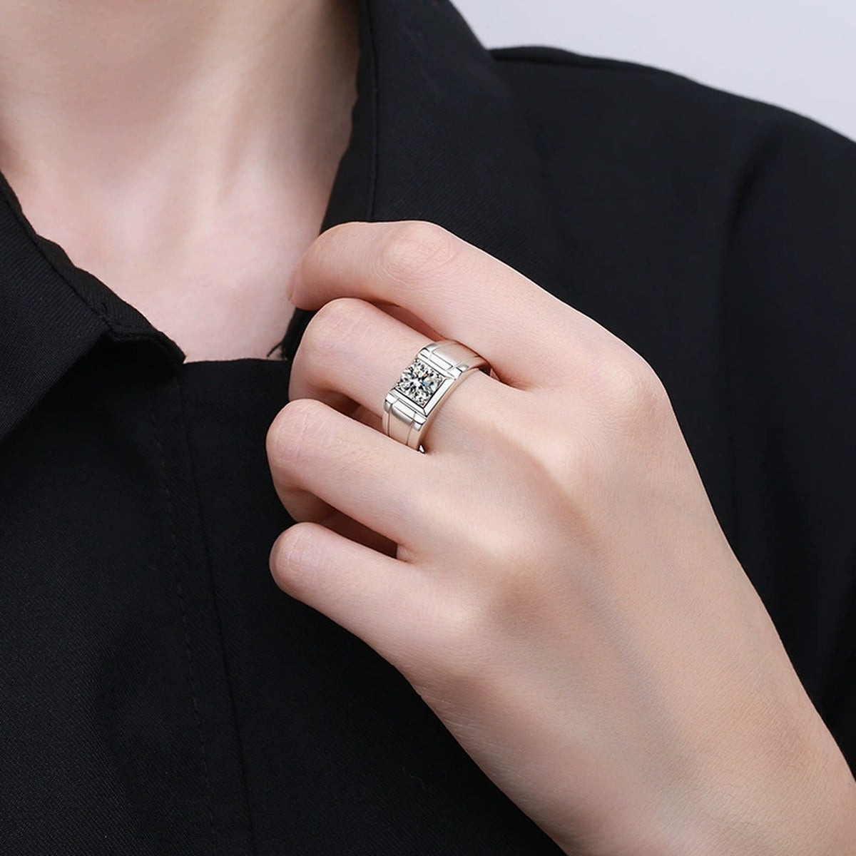 Men's Moissanite Band Ring in Rhodium-Plated S925 Sterling Silver worn on hand, showing scale, finger coverage, and rhodium-plated finish