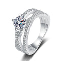 Round Moissanite Split Shank Ring with CZ in rhodium-plated S925 sterling silver on clean white background